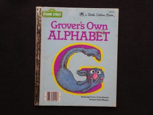 Grover's Own Alphabet- U